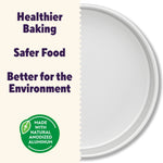 Partial top view of a round aluminum pan accompanied by text promoting healthier baking and a green anodized aluminum badge.