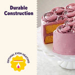 Promotional panel showing a frosted layered cake slice beside text reading “Durable Construction” and an optimal heating icon.