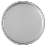 Close-up overhead shot of a round aluminum cake pan showing smooth interior and rolled rim edge.
