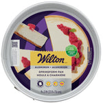 Top-down view of Wilton branded round springform pan packaging showing cheesecake graphic and product label