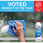 Hand wiping a window with a blue cloth and a Windex Fast Shine Foam can shown at lower right under a banner reading voted product of the year