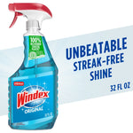Bottle of Windex Original blue glass cleaner spray with promotional 'unbeatable streak-free shine' text