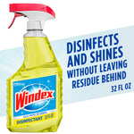 Bright yellow Windex disinfectant spray bottle with red trigger and large Windex label, text promoting disinfects and shines