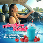 Woman driving with sunny car interior and graphic blue raspberry slushy and 'refreshing scent' promotional text