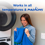 Smiling woman holding a blue garment in a laundry room beside a front-load washer with text about working in all temperatures and machines