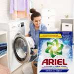 Woman loading laundry into a front-load washer with a large Ariel detergent powder bag visible in the foreground.