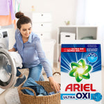 Lifestyle scene of a woman loading a washing machine with an Ariel Ultra OXI powder bag placed in the foreground