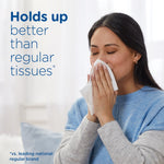Woman holding a tissue to her nose with copy stating Puffs holds up better than regular tissues