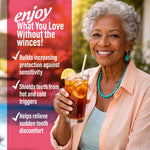Smiling woman holding a cold drink next to overlay text listing benefits like building protection and shielding teeth from hot and cold triggers.