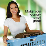 Smiling woman holding a laundry basket with folded towels and text reading 'Make your laundry smell great' in background