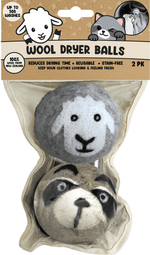 Packaged pair of wool dryer balls showing a sheep-faced ball and a raccoon-faced ball inside a clear pouch with branded header
