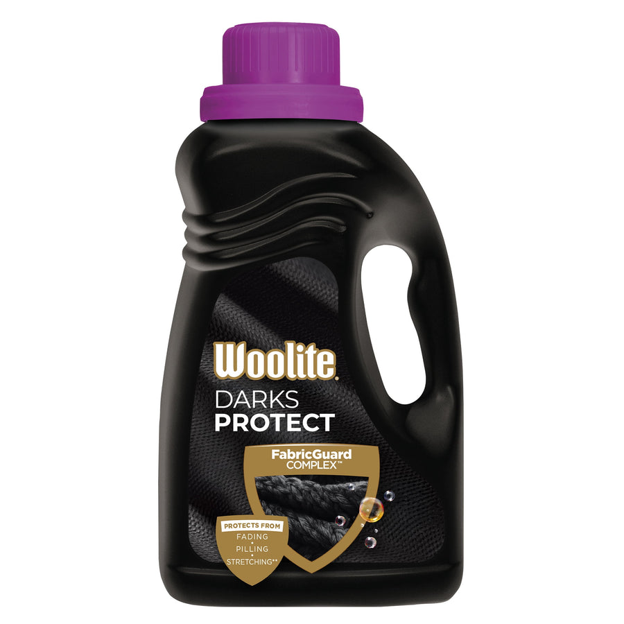 Black Woolite Darks Protect detergent bottle with purple cap and FabricGuard shield graphic on front label