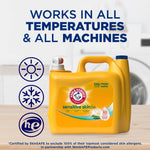 Arm & Hammer Sensitive Skin detergent jug on wooden surface with icons and headline 'Works in all temperatures & all machines'