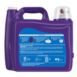 Back view of a purple Xtra detergent jug showing directions, caution panel and brand commitment icons on the label