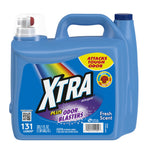 Blue jug of XTRA laundry detergent with label 'Plus Odor Blasters' and carrying handle, fresh scent branding visible