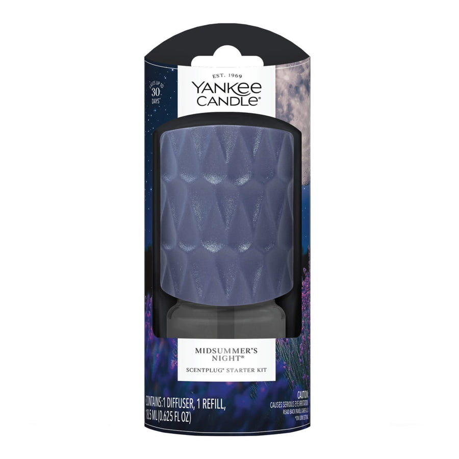 Packaged Yankee Candle ScentPlug starter kit with navy textured diffuser cap and visible refill bottle