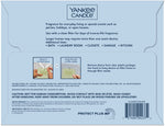 Back of Yankee Candle product packaging with usage instructions, small diagrams and brand logo on pale blue background