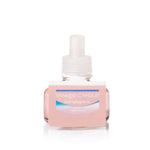 Single pink Yankee Candle ScentPlug refill bottle with white cap and label on a white background.