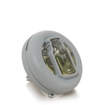 Close-up studio shot of the Yankee Candle Smart Scent vent clip showing the circular grey housing and small fragrance bottle