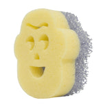Yellow character-shaped kitchen sponge with a textured purple scrubber layer along the back edge
