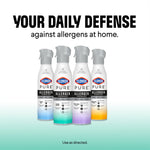 Four Clorox PURE Allergen Neutralizer spray cans in a row with headline 'Your daily defense' above on a white-to-teal background.