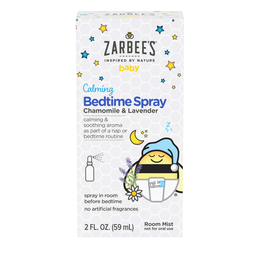 Front-facing product box of Zarbee's Baby Calming Bedtime Spray with bee mascot and chamomile and lavender artwork