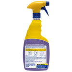Rear label view of a yellow-and-purple Zep spray bottle showing instructions and warning text on white background