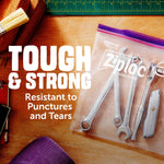 Ziploc heavy duty bag on a wooden work surface holding wrenches and a utility knife, with text proclaiming 'Tough & Strong'.