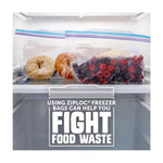 Two Ziploc freezer bags in a fridge shelf containing bagels and mixed berries with overlay text about fighting food waste
