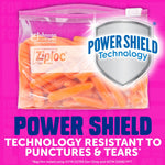 Clear Ziploc slider bag filled with carrots and a prominent 'Power Shield Technology' shield graphic on pink background
