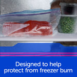 Ziploc freezer bag containing a piece of salmon on a freezer shelf next to a container of peas