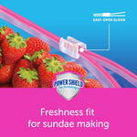 Close-up of Ziploc Slider mechanism over strawberries with Power Shield badge and freshness messaging