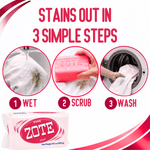 Instructional graphic showing three circular images: wet stained fabric, scrubbing with a pink Zote bar, and putting laundry into a washer.